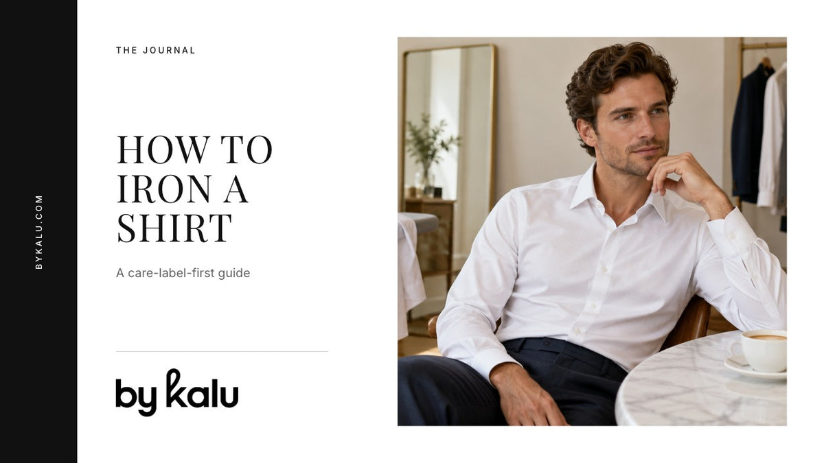 Man wearing a white shirt at home with the By Kalu logo and article headline.
