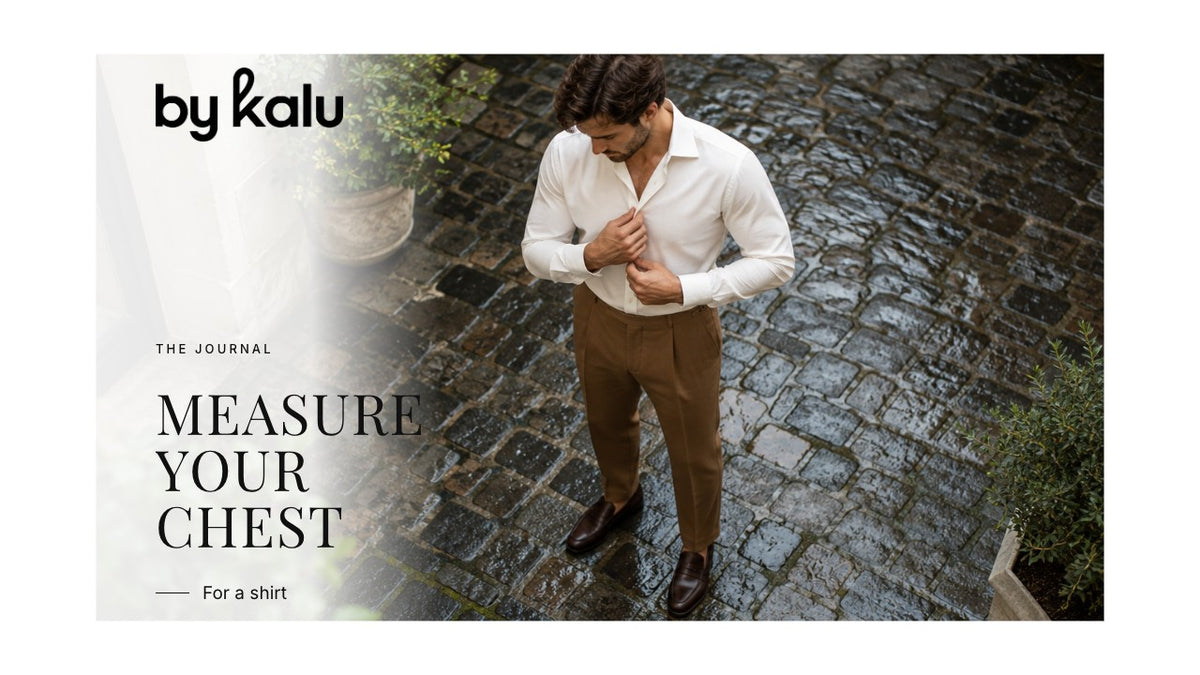 Man checking the front of a white shirt with the By Kalu logo and article headline.